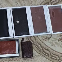 تعدادی کیف جیبی و کیف اداری و لب تاپ