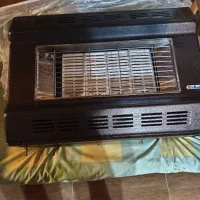 بخاری گازی آبسال دود کش دار در حد نو