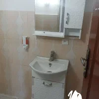 روشویی.آینه.شیر