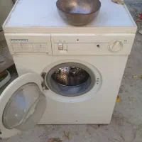 لباسشویی وکاسه مسی