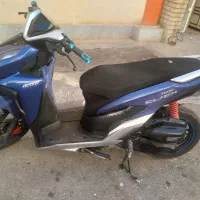 موتور کلیک توسن تکنو ۱۵۰.|موتورسیکلت|میانه, |دیوار