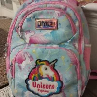 کیف مدرسه و آغوش بچه