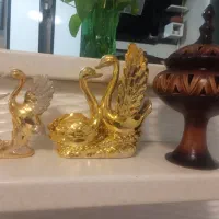 مجسمه ی دکوری وشکلات خوری سرامیکی