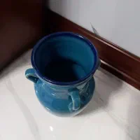 کوزه سفالی  ویک جفت پرده زبرا 128 در180 هفت میلیون