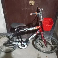 دوچرخه وخرس عروسکی