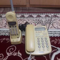 یک دستگاه تلفن بیسیم و با سیم