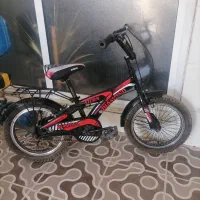 دوچرخه سایز 16 و سه چرخه  کوچک