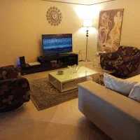 میز تلویزیون جنس ام دی آف با روکش های گلاس