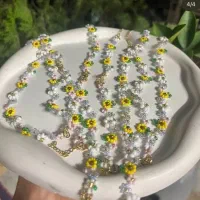 دستبند و گردنبندای گل گلی