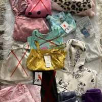 تعداد زیادی لباس مارک زارا و السی وایکیکی