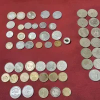 تعدادی سکه ی داخلی و خارجی باهم