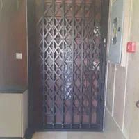 درب آکاردئونی حفاظ آهنی ضد سرقت اراک نظم آباد