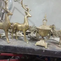 تولیدی لوستر و مجسمه برنز