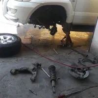 جلوبندی،تنظیم ارتفاع، تعمیراکسل عقب