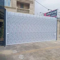 سکوریت کرکره برقی درب اپراتور شیشه ای