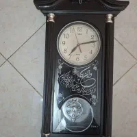 ساعت دیواری ونیکاددار