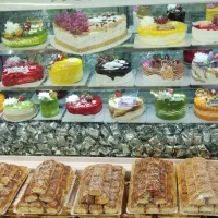 استادخلیفه شیرینی پزی قنادی کارگاه