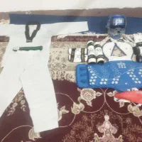 وسایل مبارزه ی تکواندو و لباس و کمربند سبز