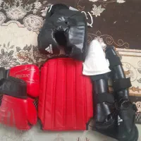 لباس ورزشی ووشو و لوازم تکواندو و....