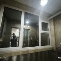 توری پلیسه و پنجره دوجداره