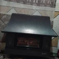 بخاری گازی و تلفزیون