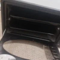 یک عدد توستر دارای دوسینی مناسب برای کیک وپیتزا|اجاق گاز و لوازم برقی پخت‌وپز|شهریار, شهرک بهاران (ویره)|دیوار