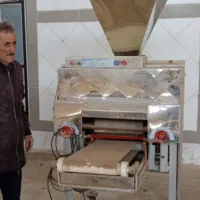 دستگاه چانه گیر خمیر نان