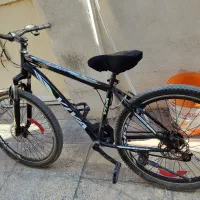 دوچرخه ویوا ترمز لقمه‌ای چراغدار راهنمادار کمک فنر