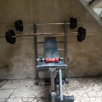 نیمکت هفت کاره میله هالتر  وزنه و دمبل