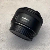 لنز کنون فیکس 50mm f1.8 STM مشابه نو