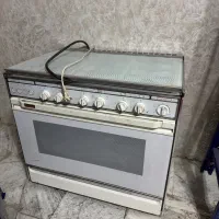 اجاق گاز فر دار  و جوجه گردون