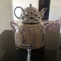 کتری و قوری یک عدد اجاق گاز