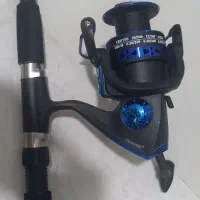 لنسرماهیگیری 210به همراه چرخ فلزی 6000 مدل YUMOSHI