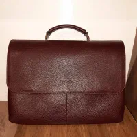 تعدادی کیف اداری مردانه چرم و ست هدیه مردانه نو