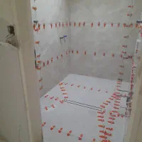 کاشیکارکاشیکاری بنایی بناسرامیک کار رفع نم بازسازی