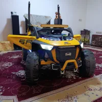 ماشین شارژی دو نفره تا 12سال در حد نو