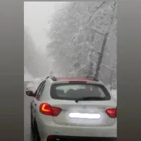 خودرو کوییک r سفید و قرمز