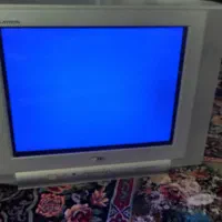 تلوزیون بهمراه میز تلوزیون شیشه ای