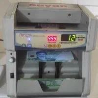 دستگاه پول. شمار سایان