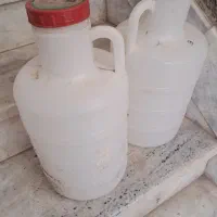 دبه خیار شوری و دبه زرد رنگ زیتون