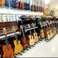 انــواع «*گیتار بـرقی و کلاسیـک٪