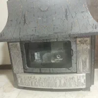 بخاری گازی شومینه ای در حد نو