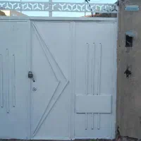 درب آهنی ماشین رو سه لنگه