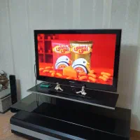 تلویزیون ۴۰ اینچ ال ای دی همراه زیر تلویزیونی