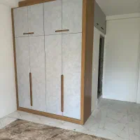 کمد دیواری و tv وال و کاور شوفاژ و کابینت آشپزخانه