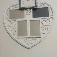 ساعت دارای قاب عکس شیشه دار