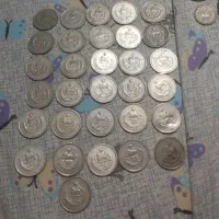 تعدادی سکه قدیمی   بفروش می‌رسد