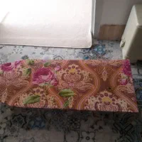 میز اتو نشسته