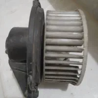 موتور فن بخاری و کولر ایسوزو. توربو. درب ترموستات