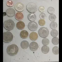 سکه پهلوی.سکه خوارجی.یک دیناری به اهن ربا میچسبد